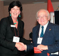 Architect, artist, author and Montreal bon vivant Harry Mayerovitch, BA'30, BArch'33, received a McGill gift from Alumni Association Vice-President Morna Flood Consedine, MEd'77, DEd'85, as a representative from one of the earliest graduating classes attending Homecoming this year.