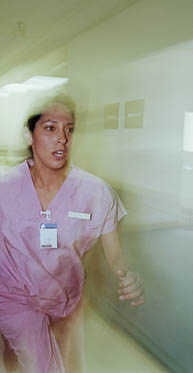 Nurse running in hospital.