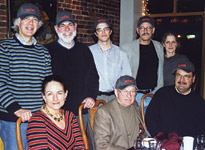 McGill Architecture professor Robert Mellin, MArch'84, (back row, 2nd from right) and Communications Associate Helen Dyer (not pictured) coaxed St. John's grads out for an evening at the Taj Mahal restaurant with the promise of free McGill caps.