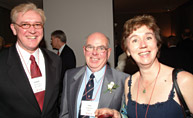 President of the Year Tim Houlihan, MUP'76, centre, with Harry Zarins, BEd'74, MEd'79, and Arlene Ewert.