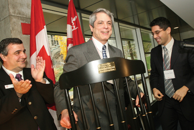 Lorne Trottier presenting the chair.